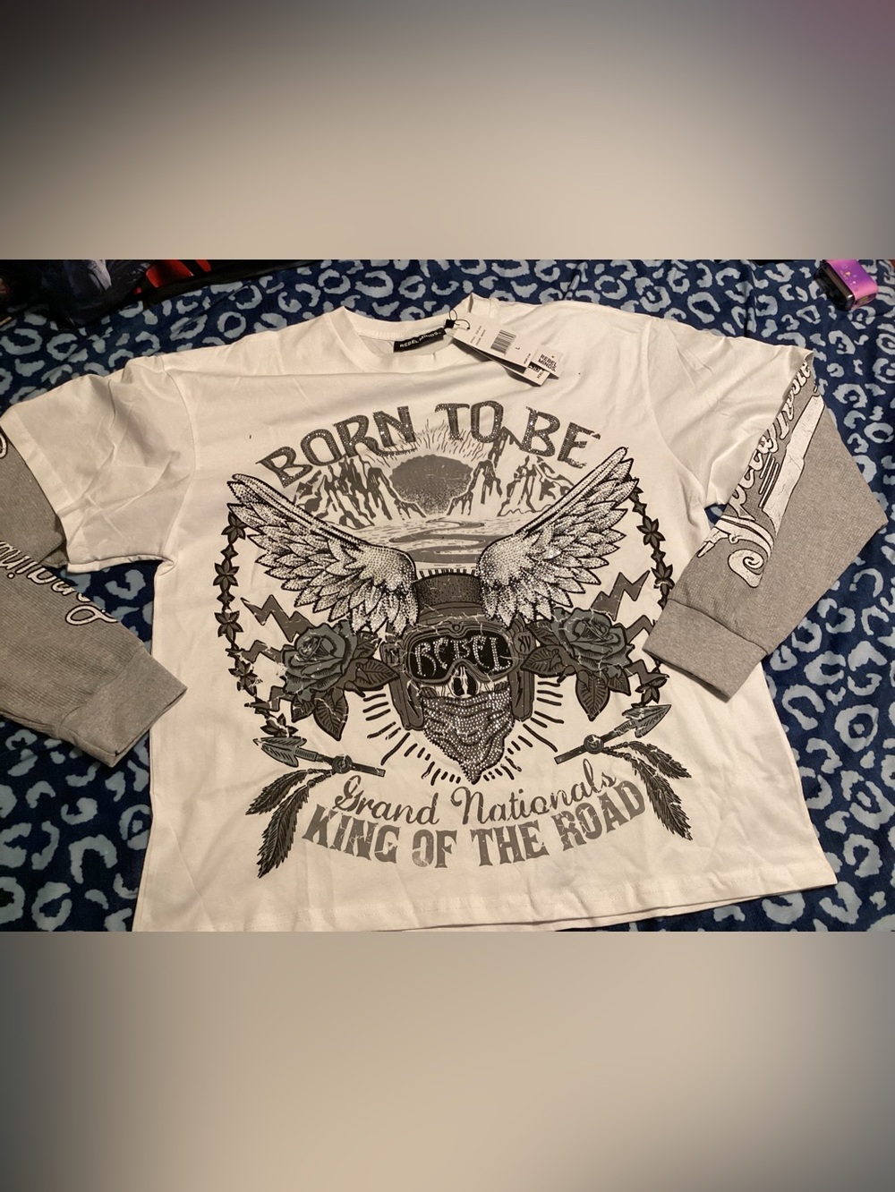 Rebel Minds White Graphic Tee with Black Skull & Wing Design
